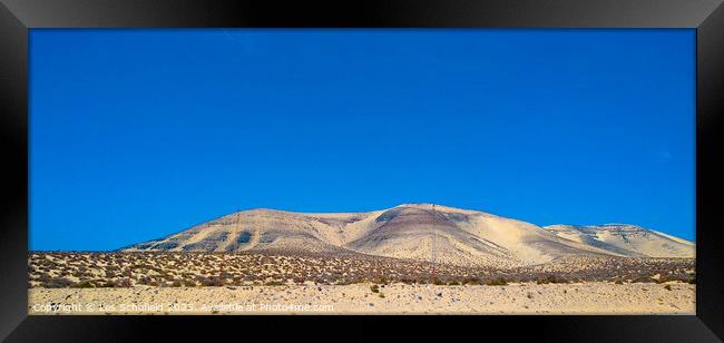 Mountains and sand dunes fuerteventura  Framed Print by Les Schofield