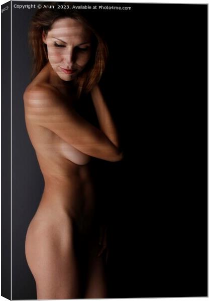 Beautiful nude white woman in a studio Canvas Print by Arun 