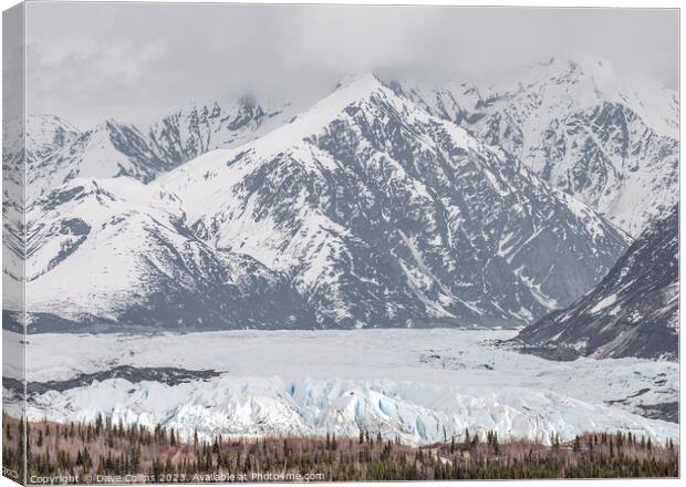 Matanuska Glacier face with snow covered mountains behind in Alaska, USA Canvas Print by Dave Collins