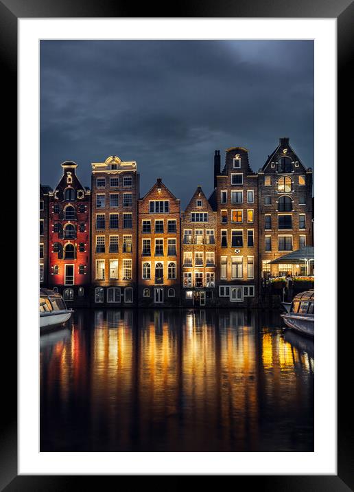 Night dancing houses at Amsterdam canal Damrak, Holland, Netherl Framed Mounted Print by Olga Peddi