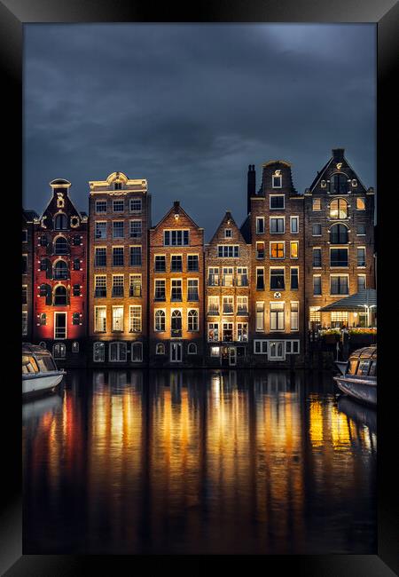Night dancing houses at Amsterdam canal Damrak, Holland, Netherl Framed Print by Olga Peddi