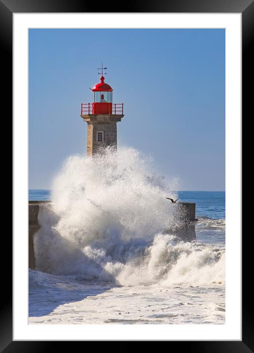 Storm waves over the Lighthouse Framed Mounted Print by Olga Peddi