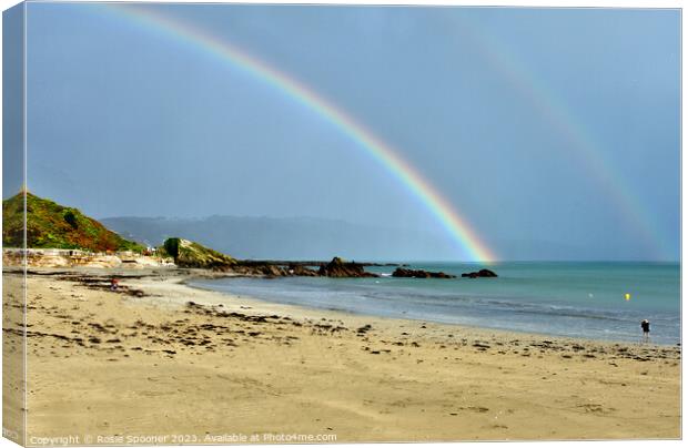 Rainbow on Looe Beach in Cornwall Canvas Print by Rosie Spooner