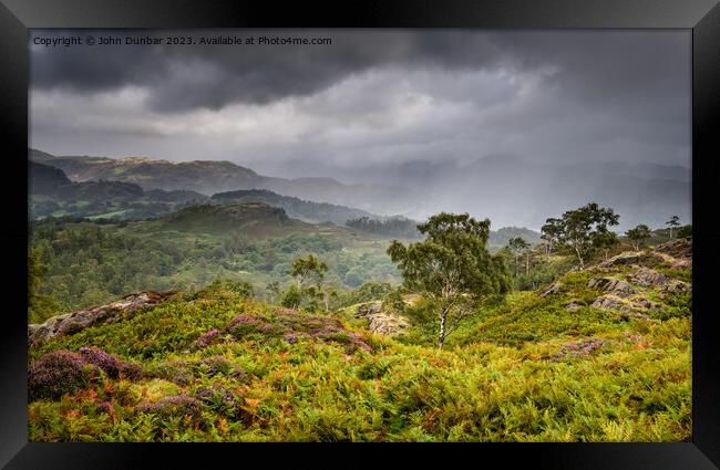 Holme Fell Rain Showers Framed Print by John Dunbar