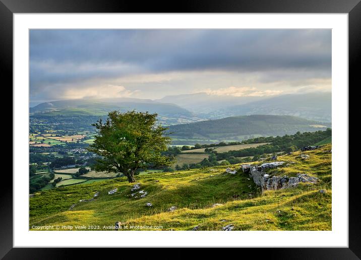 Dramatic early morning light on Llangynidr Moors. Framed Mounted Print by Philip Veale