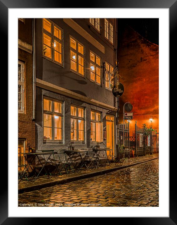 an old restaurant at night in the old town of Copenhagen Framed Mounted Print by Stig Alenäs