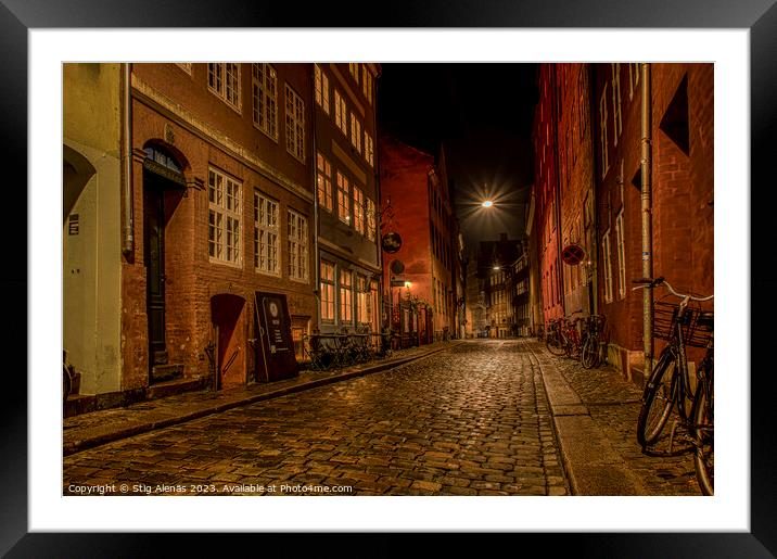 narrow alleyway at night in the city of Copenhagen Framed Mounted Print by Stig Alenäs