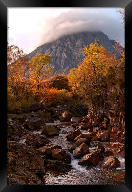 A waterfall with Buachaille Etive Mor in the background Framed Print by Tony Bishop