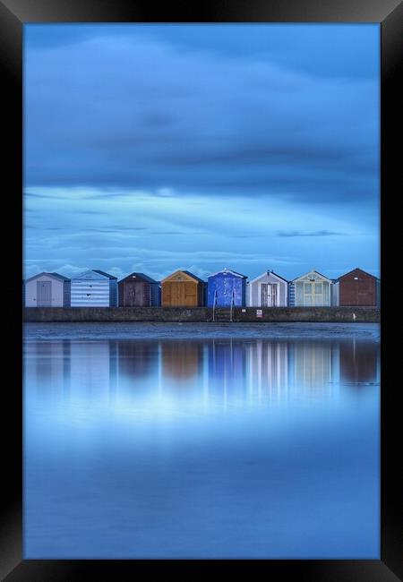Early morning blue over Brightlingsea beach huts  Framed Print by Tony lopez