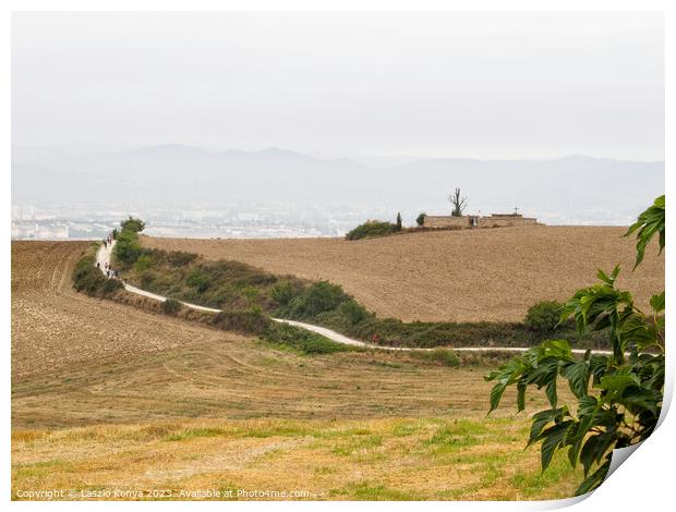 Pilgrims on the Camino - Pamplona  Print by Laszlo Konya