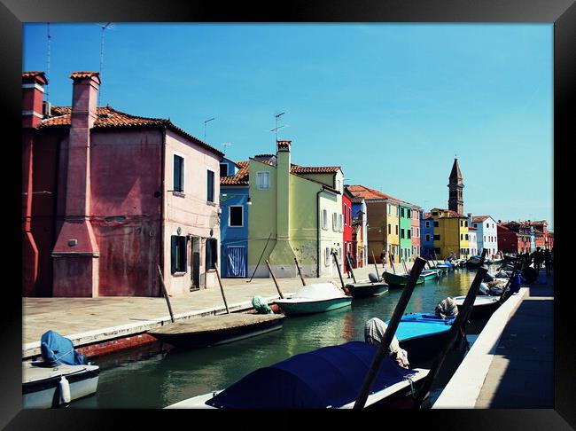 Street with colorful buildings in Burano island, Venice, Italy Framed Print by Virginija Vaidakaviciene