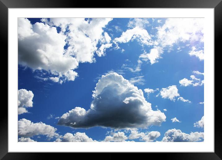 White clouds in blue sky. Blue sky background Framed Mounted Print by Virginija Vaidakaviciene