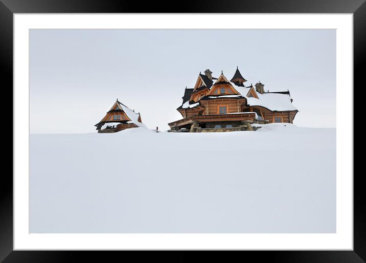  Village in winter Framed Mounted Print by Olga Peddi