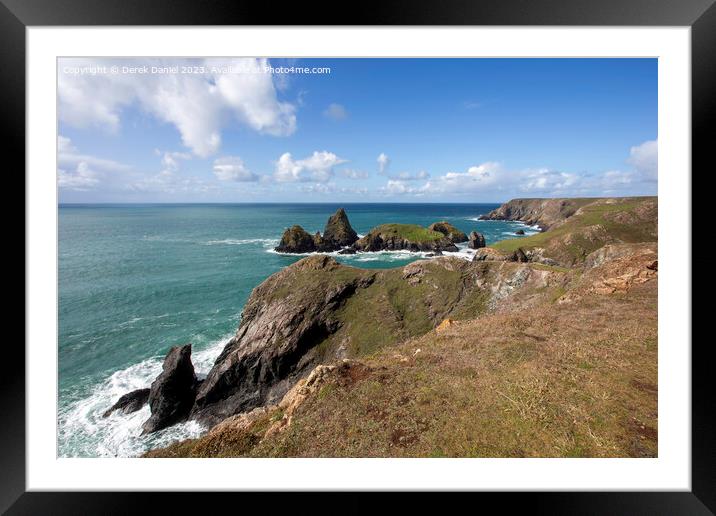 A walk along the clifftop at Kynance Cove, Cornwall  Framed Mounted Print by Derek Daniel