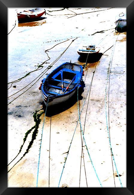 Moored and beached Framed Print by john hill