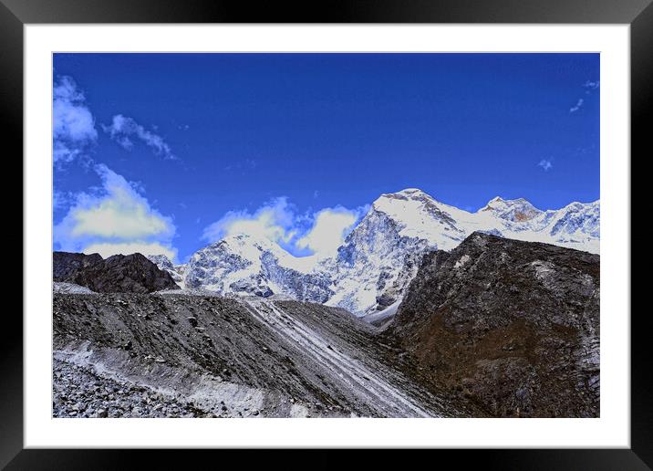distant snow covered peaks Framed Mounted Print by Steve Painter