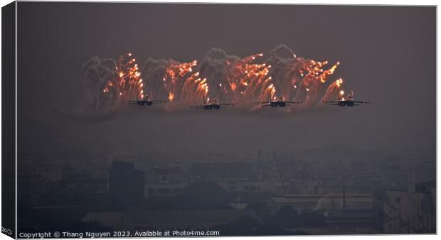 SU30MK2 squadron performing tight formation while shooting flares Canvas Print by Thang Nguyen