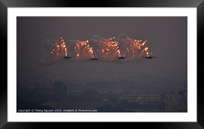SU30MK2 squadron performing tight formation while shooting flares Framed Mounted Print by Thang Nguyen