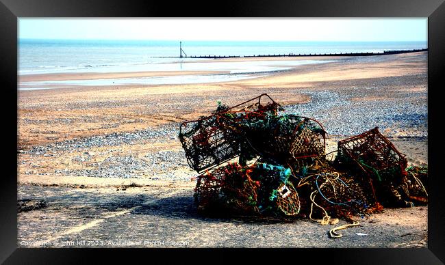 Rusting Crab and Lobster pots. Framed Print by john hill