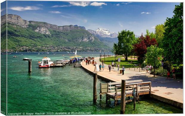 A busy day on Lake Annecy Canvas Print by Roger Mechan