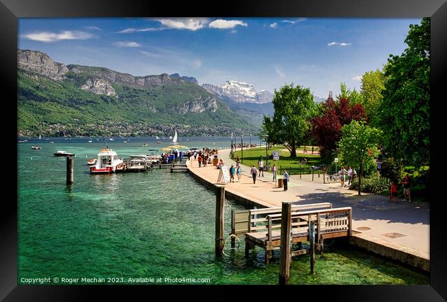 A busy day on Lake Annecy Framed Print by Roger Mechan