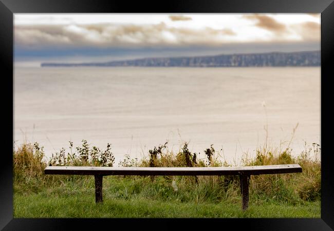 A bench view over Filey Bay Framed Print by Glen Allen