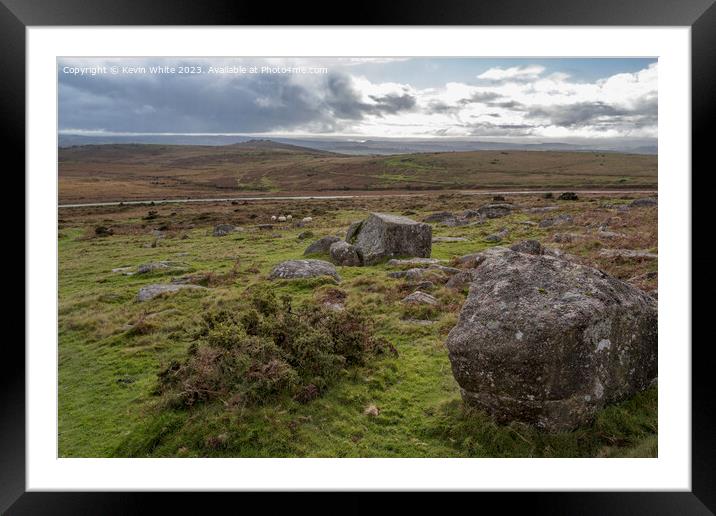 Rugged desolate Dartmoor with single road in background Framed Mounted Print by Kevin White