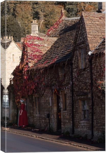 Red Autumn leaves at Castle Combe  Canvas Print by Duncan Savidge