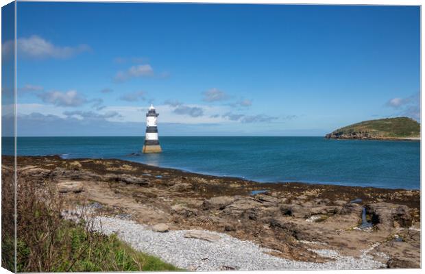 Penmon Lighthouse. and Puffin Island, Canvas Print by Kevin Hellon