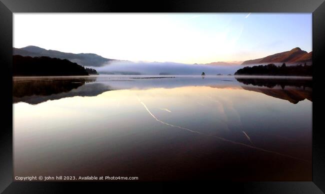 Morning mist and airplane trails, Keswick, Cumbria, UK. Framed Print by john hill