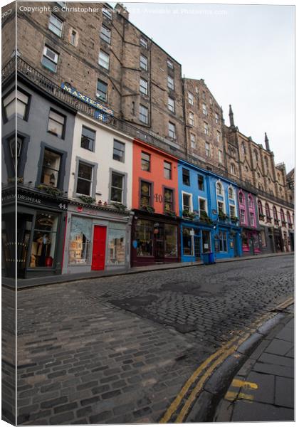 Colourful row of shops on Victoria Street, Edinburgh Canvas Print by Christopher Keeley