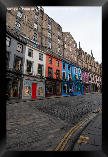 Colourful row of shops on Victoria Street, Edinburgh Framed Print by Christopher Keeley