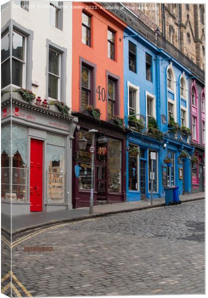 Row of colourful shops on Victoria Street, Edinburgh Canvas Print by Christopher Keeley