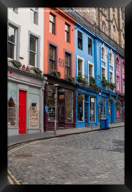 Row of colourful shops on Victoria Street, Edinburgh Framed Print by Christopher Keeley