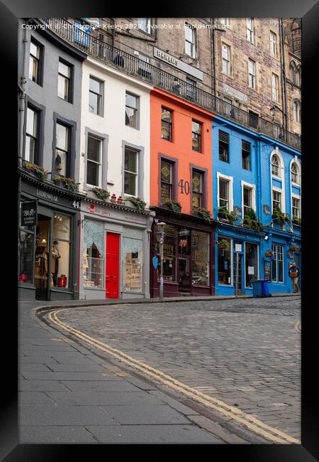Historic Victoria Street and colourful shop fronts in Edinburgh Framed Print by Christopher Keeley
