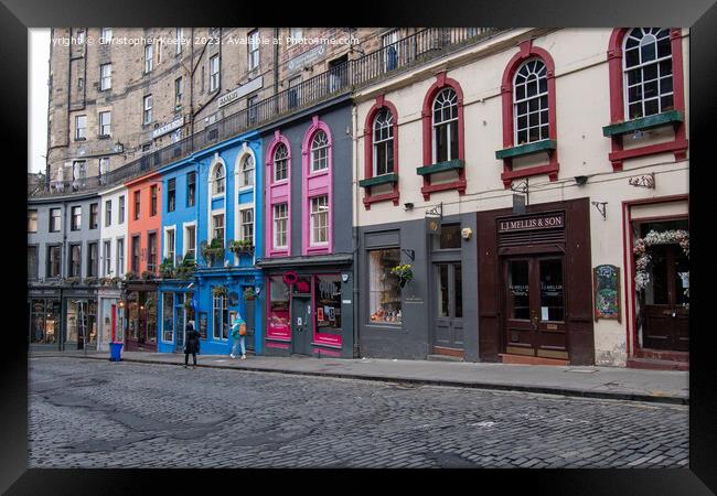 Victoria Street colourful shop fronts in Old Town, Edinburgh Framed Print by Christopher Keeley