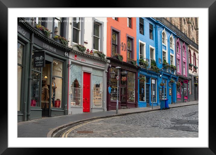 Victoria Street charming row of shops in Edinburgh Framed Mounted Print by Christopher Keeley