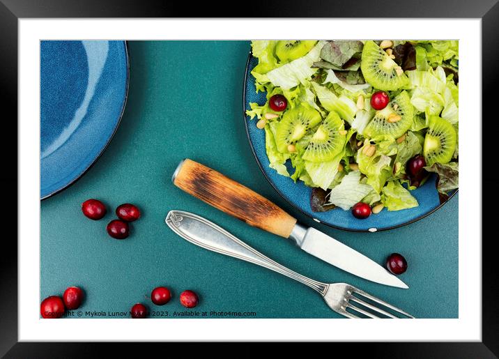 Healthy salad of kiwi and herbs. Framed Mounted Print by Mykola Lunov Mykola