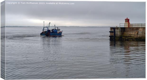 Fishing boat, leaving Burghead harbour Canvas Print by Tom McPherson