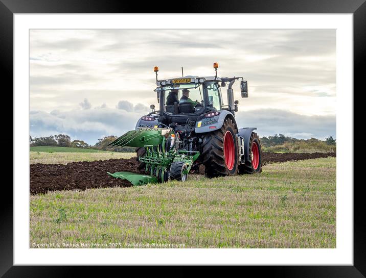 Modern Tractor Ploughing Framed Mounted Print by Rodney Hutchinson