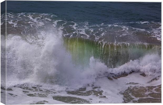Wild wave in Nazare at the Atlantic ocean coast of Canvas Print by Olga Peddi