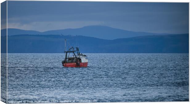 lone fishing boat on the Moray Firth Canvas Print by Tom McPherson