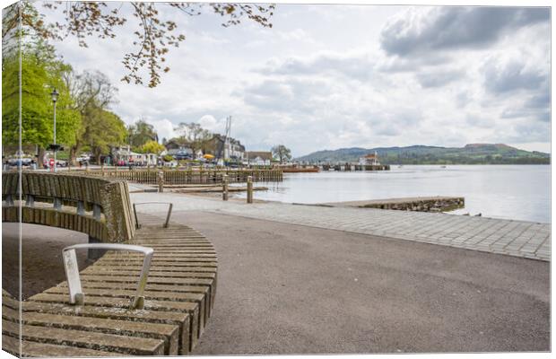 Curved bench overlooking the Ambleside waterfront Canvas Print by Jason Wells