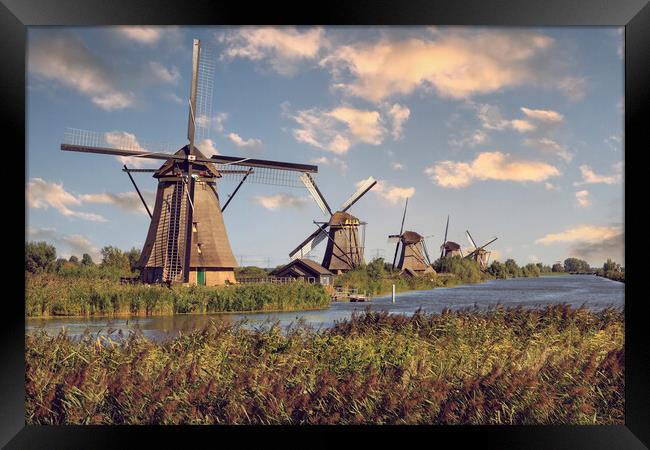 Windmill in Kinderdijk, Holland Framed Print by Olga Peddi