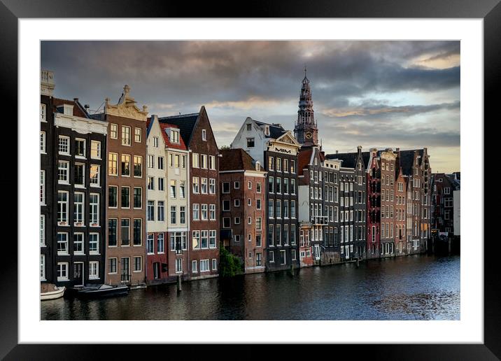 Houses along an Amsterdam canal. Summer cloudy day Framed Mounted Print by Olga Peddi