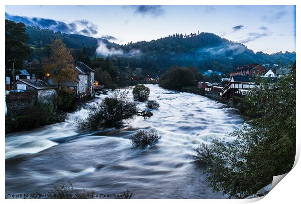 Ghostly mist hangs over the Welsh town of Llangollen Print by Clive Wells