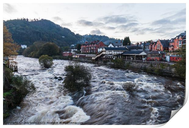High water level in Llangollen Print by Clive Wells