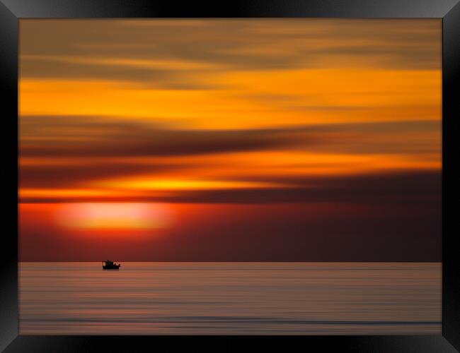 Boat on the horizon with sunrise (Horizon Dreams) Framed Print by Martyn Large