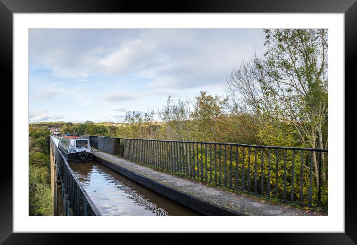 Narrow boat passing over the Pontcysyllte Aqueduct Framed Mounted Print by Jason Wells
