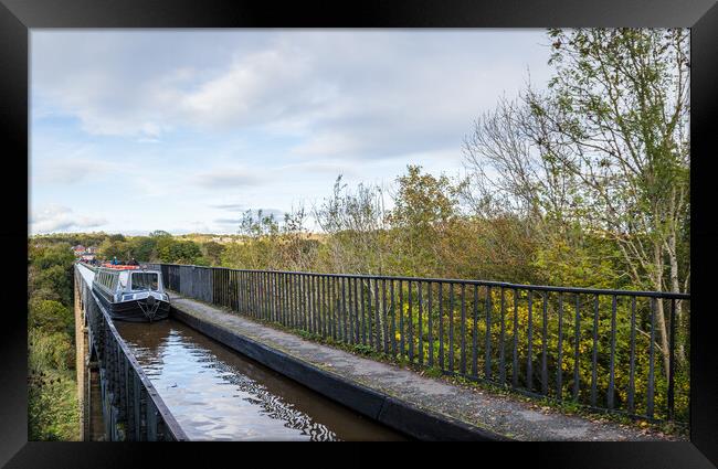 Narrow boat passing over the Pontcysyllte Aqueduct Framed Print by Jason Wells